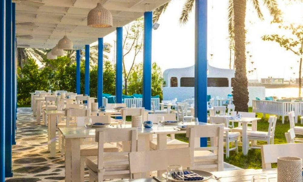 Outdoor terrace at Fish Beach Taverna