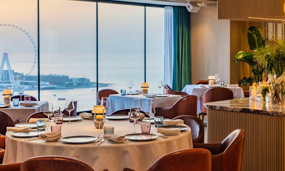 Table and chairs restaurant Dubai view